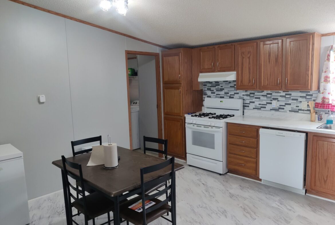 Kitchen of Charming 3-Bedroom Home in Pontiac | Double wide mobile home | Solid Kitchen & Living Spaces