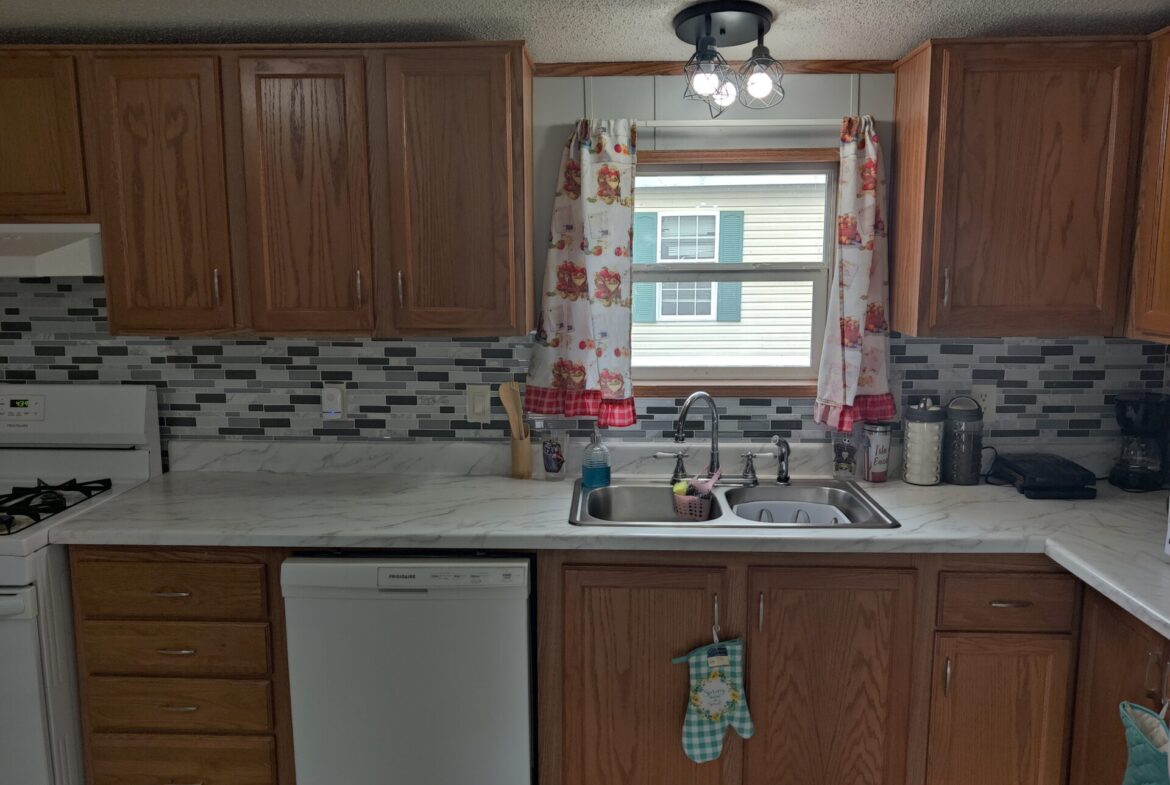 Kitchen of Charming 3-Bedroom Home in Pontiac | Double wide manufactured home | Solid Kitchen & Living Spaces