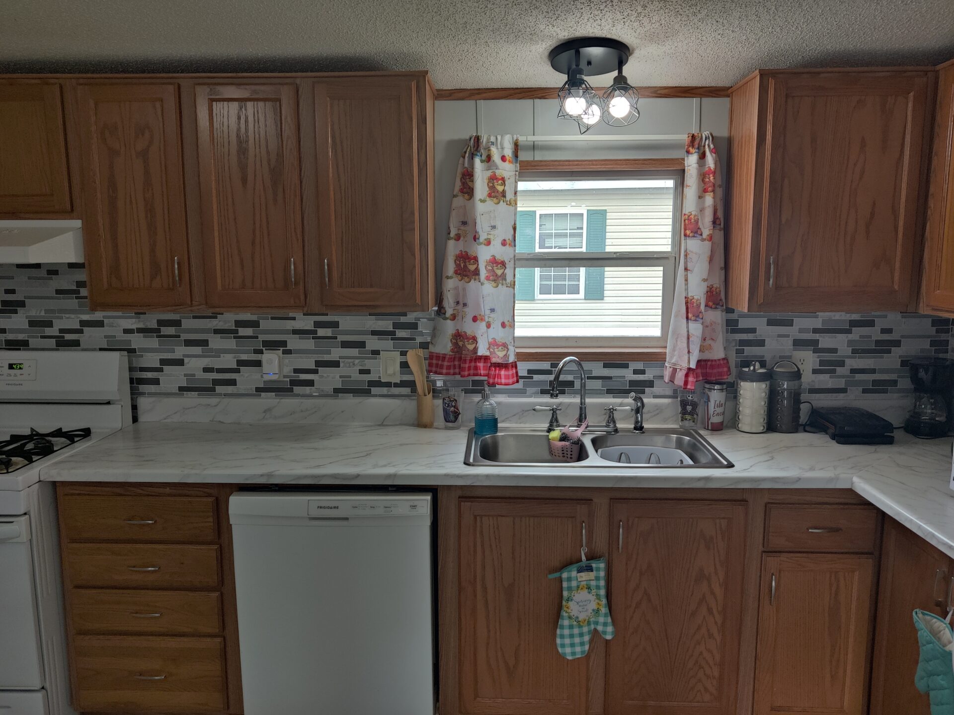 Kitchen of Charming 3-Bedroom Home in Pontiac | Double wide manufactured home | Solid Kitchen & Living Spaces