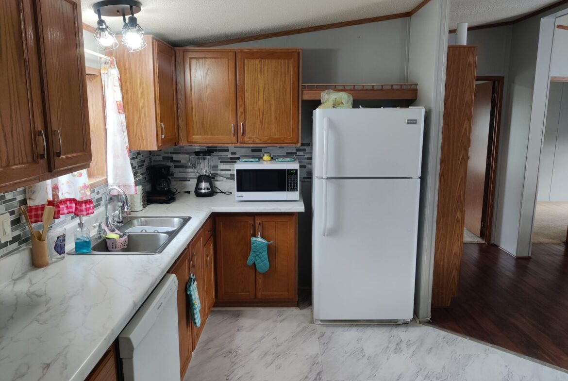 Kitchen of Charming 3-Bedroom Home in Pontiac | Double wide manufactured home | Solid Kitchen & Living Spaces