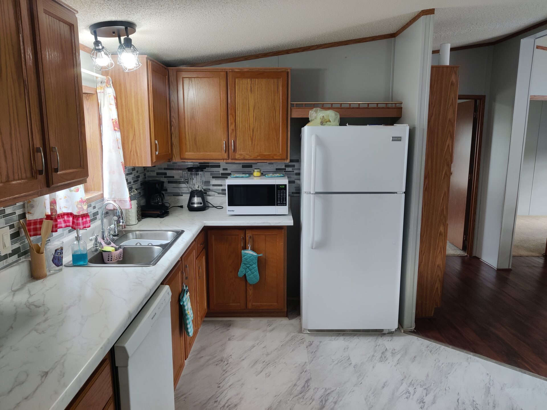 Kitchen of Charming 3-Bedroom Home in Pontiac | Double wide manufactured home | Solid Kitchen & Living Spaces