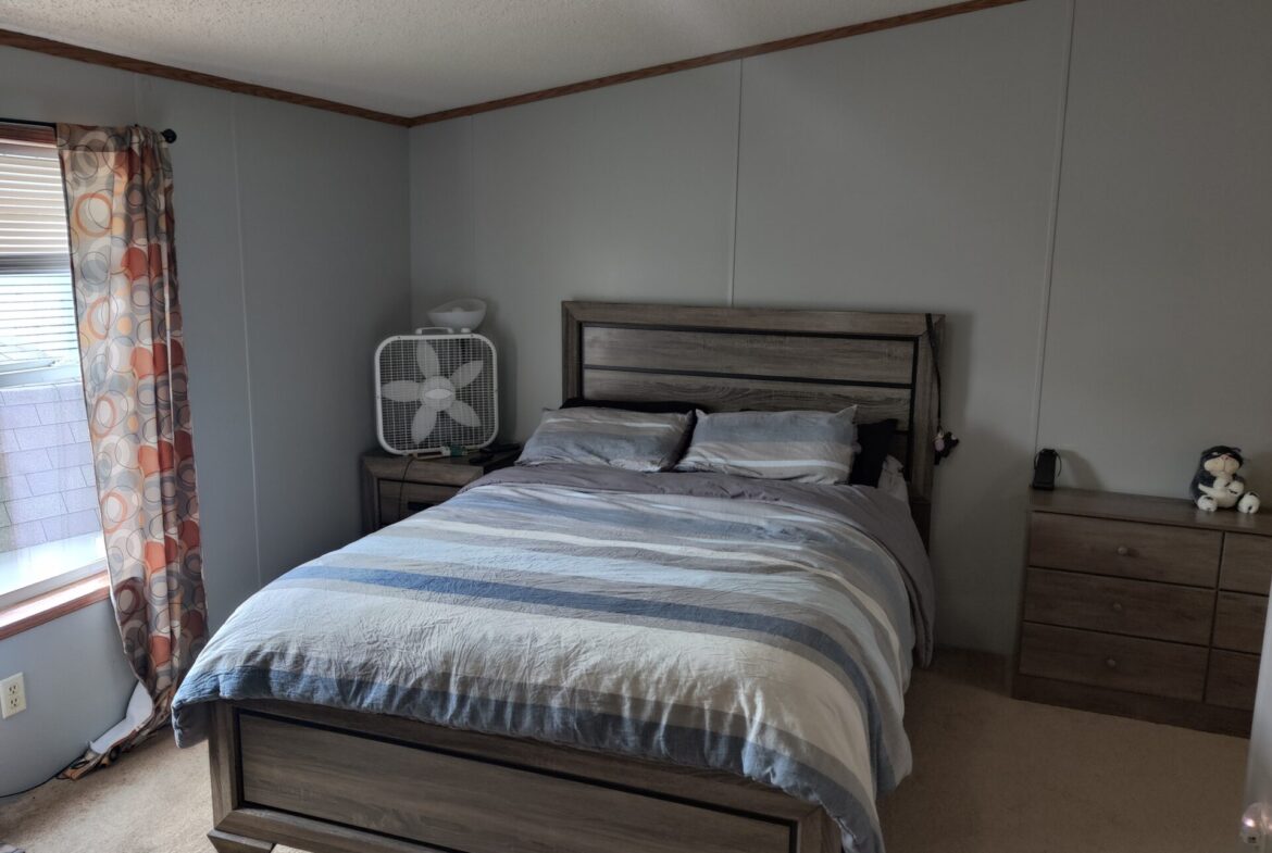 Bedroom of double wide manufactured home for sale in Pontiac | Michigan Manufactured Homes for Sale