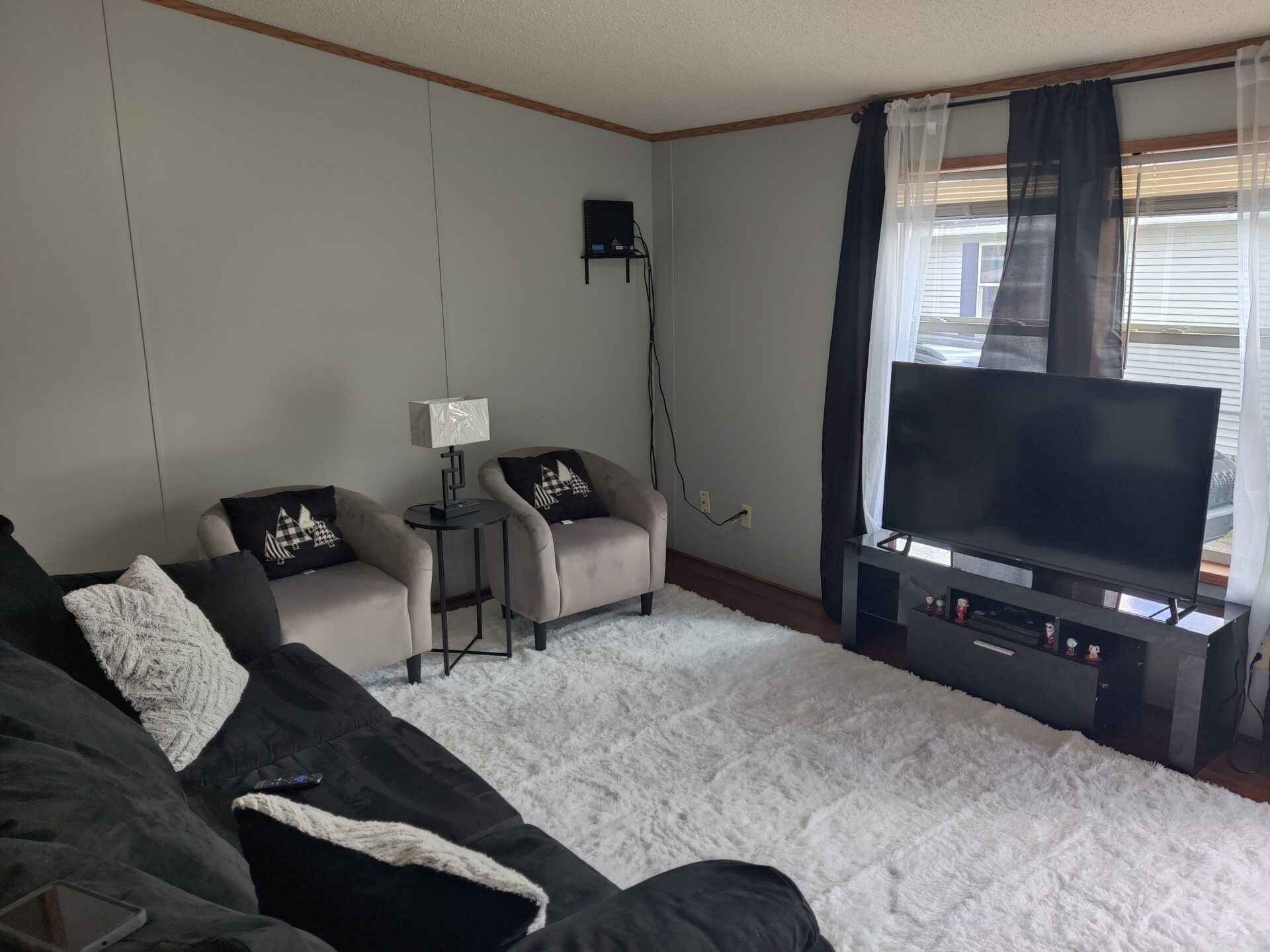 Living room of double wide manufactured home for sale in Pontiac | Buy manufactured home Michigan