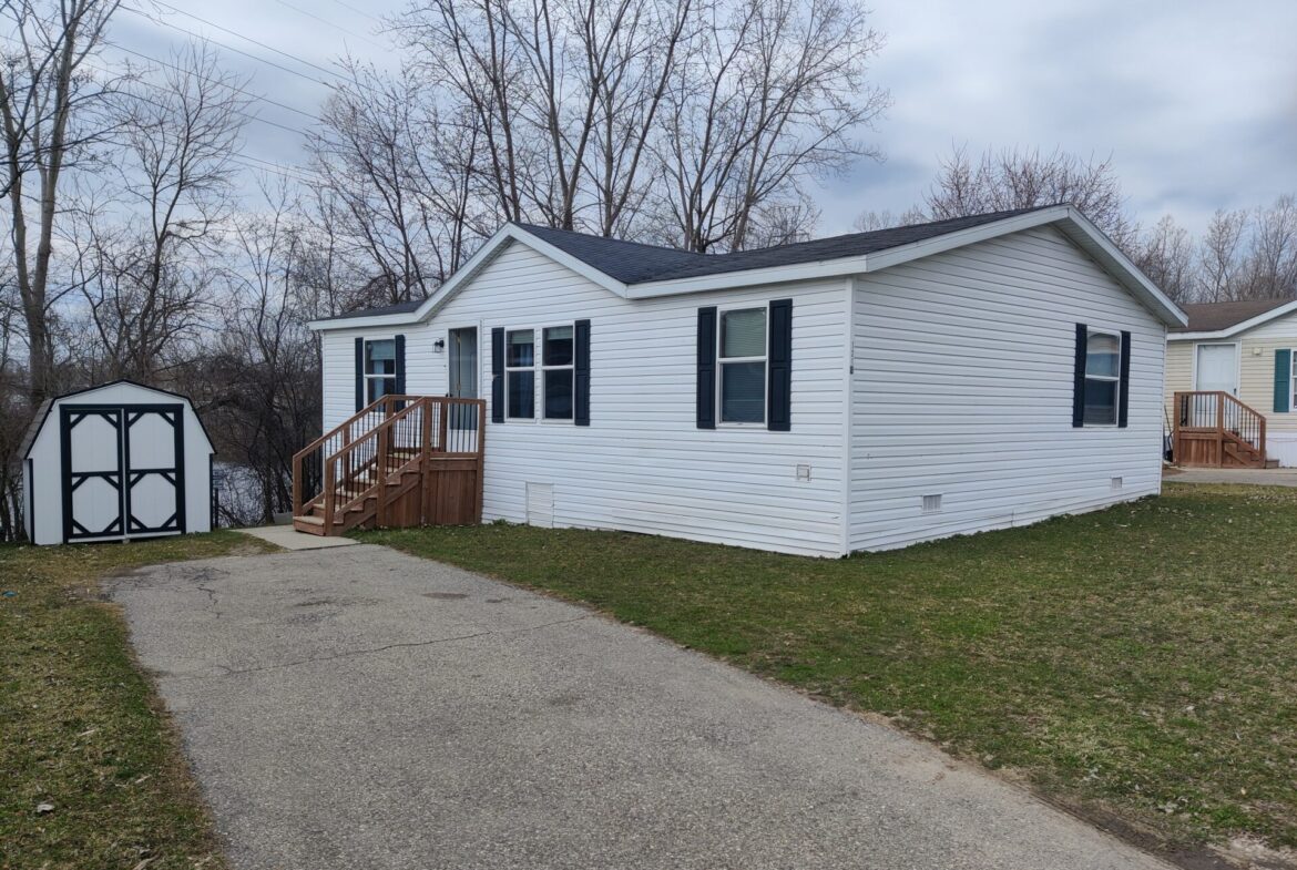 Outside of Charming 3-Bedroom Home in Pontiac | Double Wide Mobile Home For Sale | Walton Ridge Estates Michigan