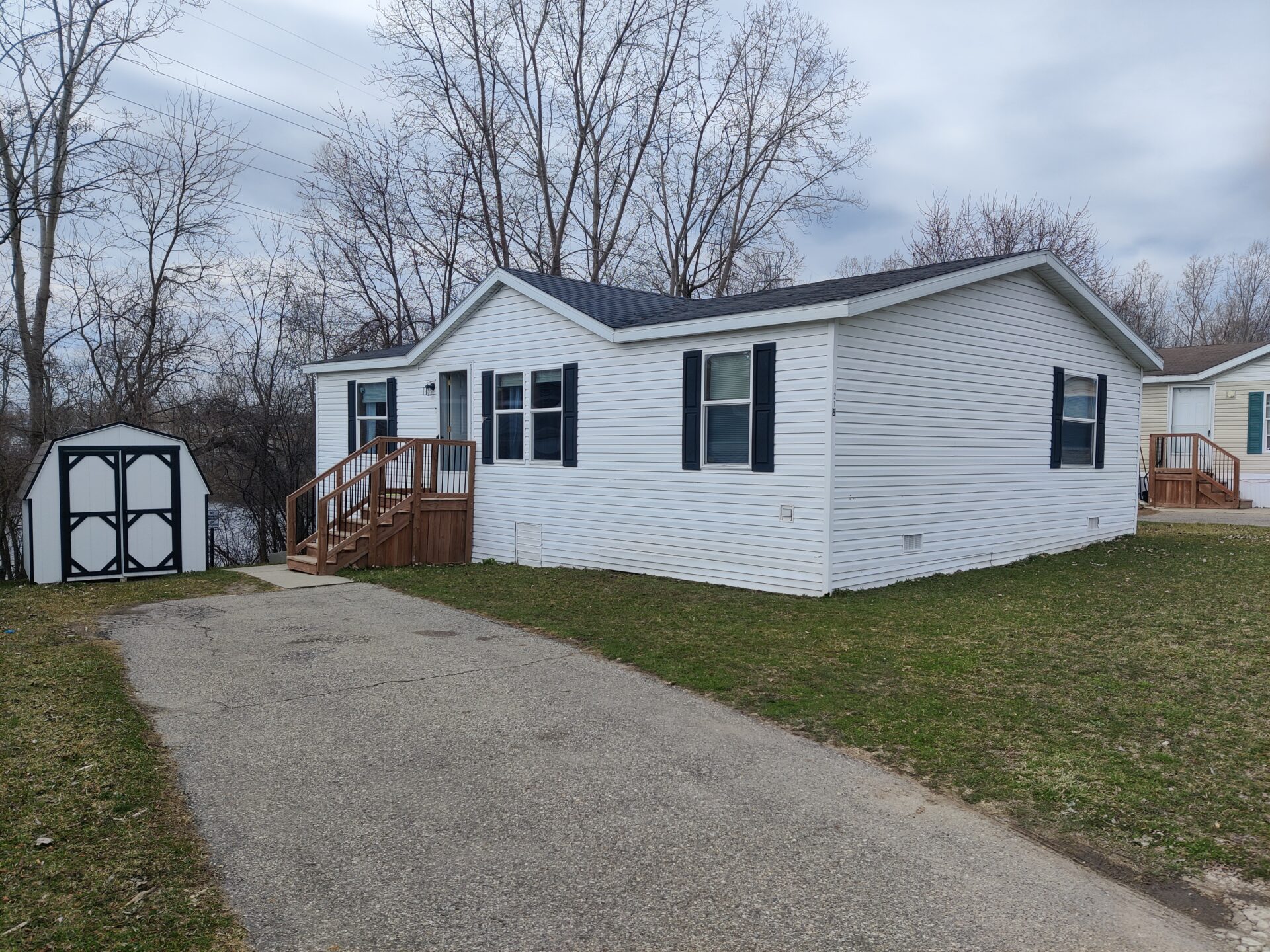 Outside of Charming 3-Bedroom Home in Pontiac | Double Wide Mobile Home For Sale | Walton Ridge Estates Michigan