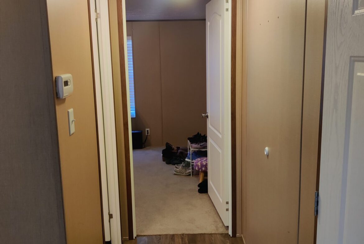 Hallway of single wide manufactured home for sale in Clinton Township | Buy a Michigan mobile home