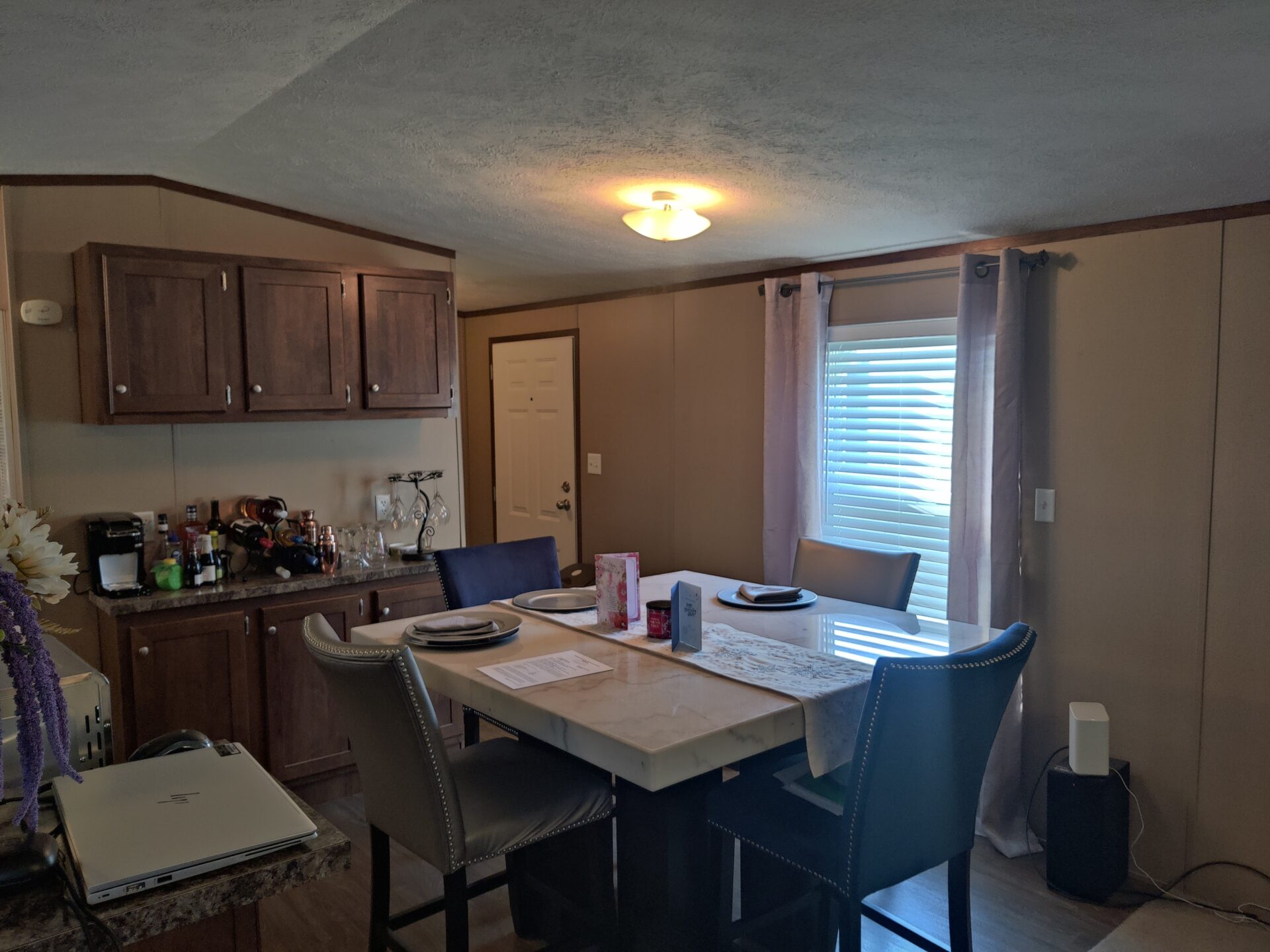 Dining room of single wide manufactured home for sale in River's Edge, Clinton Township | Used Mobile Home for Sale Michigan