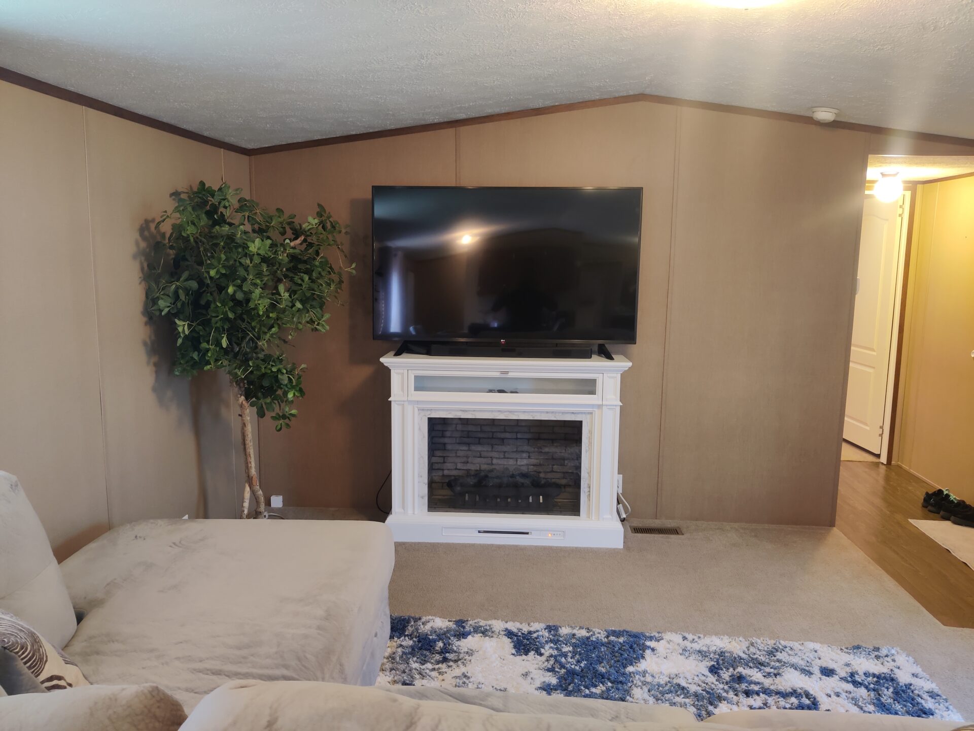 Living room of single wide manufactured home for sale in River's Edge, Clinton Township | Used Mobile Home for Sale Michigan