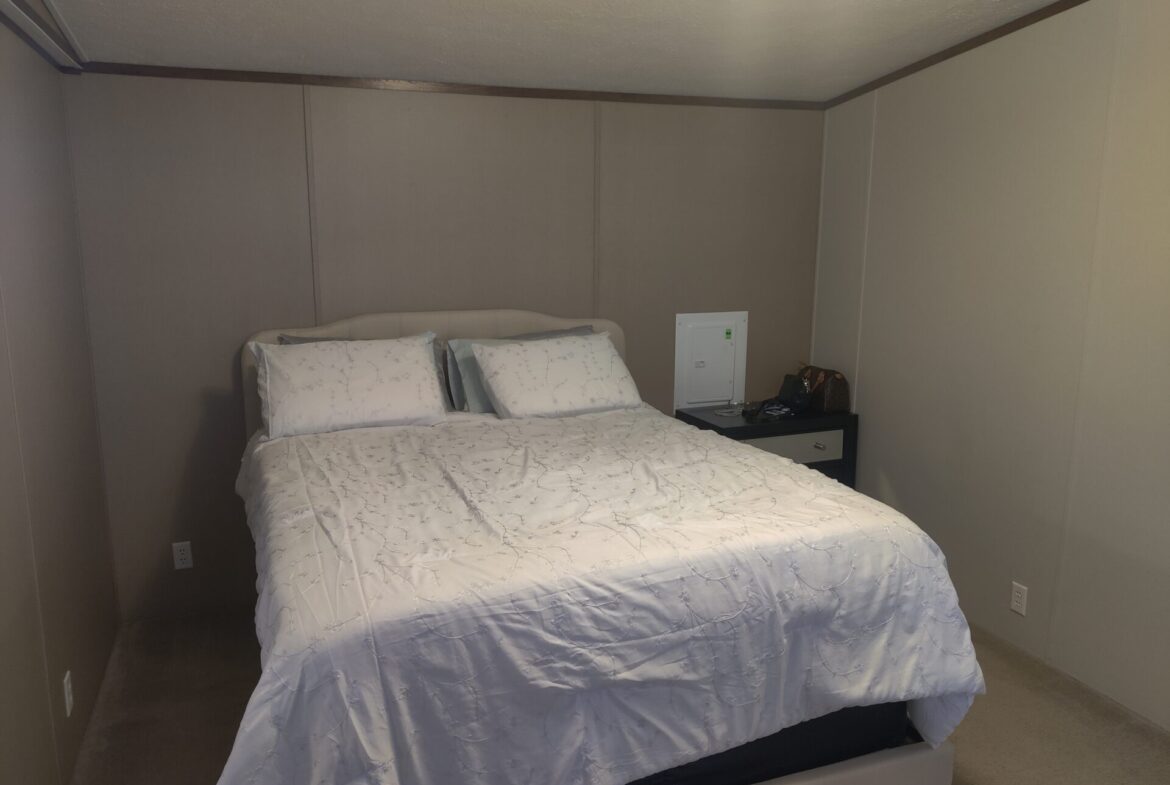 Second bedroom of single wide manufactured home for sale in River's Edge, Clinton Township | Help buying mobile home