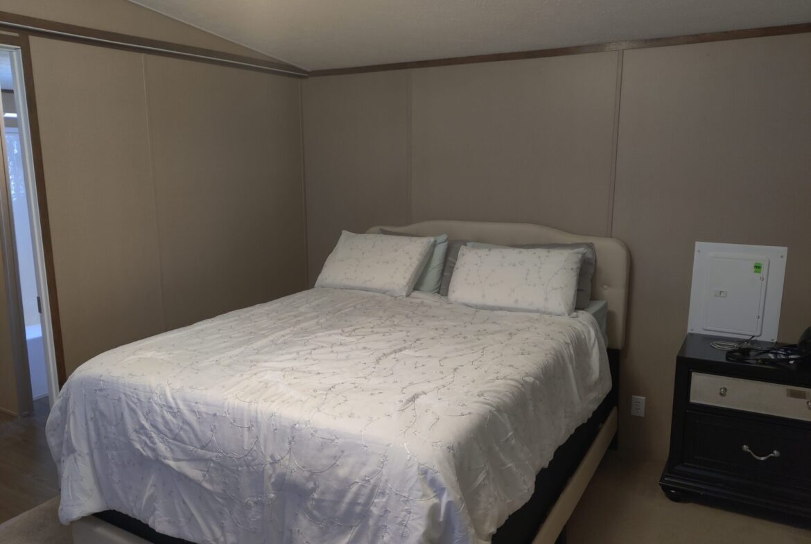 Second bedroom of single wide manufactured home for sale in River's Edge, Clinton Township | Buy a Michigan mobile home