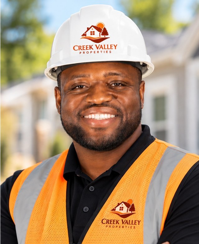 Justin Ibe, President of Creek Valley Properties, in a hard hat